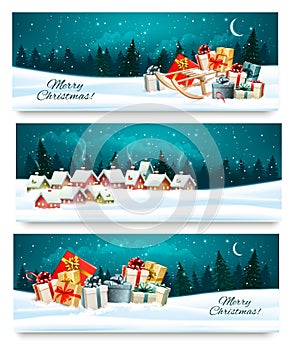 Three Christmas festive banners with landscapes and gift boxes.