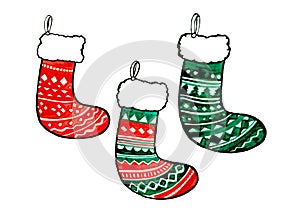 Three Christmas socks isolated on white background. Red and green colors.