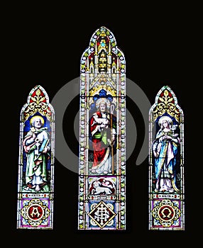 Three church stained glass windows,