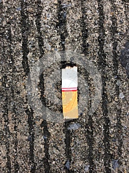 Three cigarettes butts on the ground