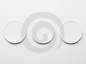 Three circular objects arranged in a row