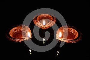 Three Clay Diyas