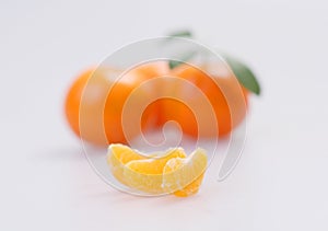 Three clementines with segments