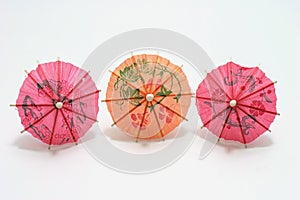 Three cocktail umbrella