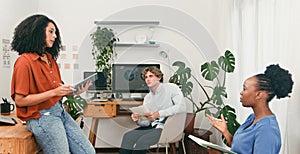 Team Meeting In Modern Office With Plants And Laptops, Collaborative Discussion