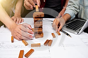 Three colleagues discussing meeting