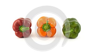 Three color bell peppers isolated close up