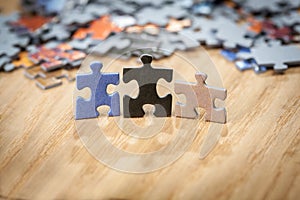 Three color jigsaw puzzle pieces