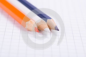 Three color pencils, closeup