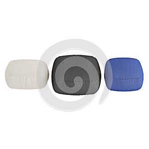 Three color soft poufs on a white background. 3d rendering