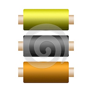 Three colored coils with a thread on a white background