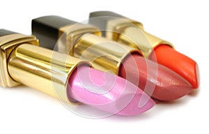 Three colored lipsticks