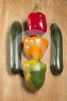 Three peppers and two zucchini