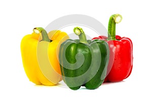 Three colored red Yellow green Fresh bell pepper vegetarian ripe pepper paprika spices isolate