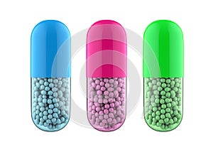 Three colored vitamin or antibiotics pills.