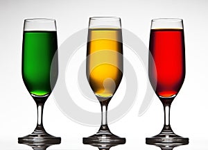 Three colored wine glasses.