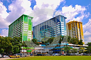 Three colorful apartment buildings in Rochor Center in Singapore