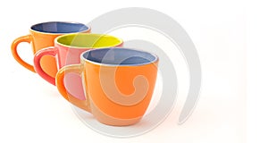 Three colorful coffee cups