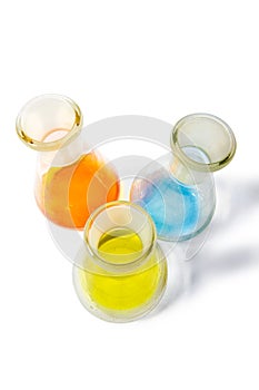 Three colorful flasks