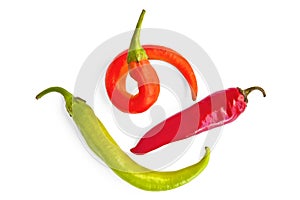 Three colorful hot peppers
