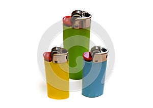 Three colorful lighters isolated on white background with copy space