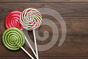 Three colorful lollipops