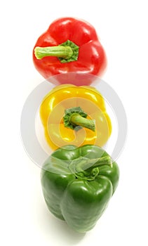 Three colorful paprikas