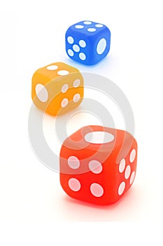 Three colorful rubber dice