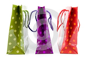 Three colorful shopping bags