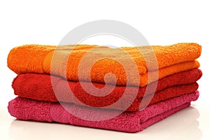 Three colorful towels