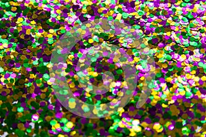 Three colors green, gold and purple. Traditional of Mardi Gras festive. glitter sequins of Mardi Gras celebration color background