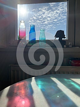 Three colour glass bottles