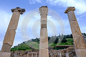 Three columns of Memmius Monument in Ephesus ruins, historical ancient Roman archaeological sites in eastern Mediterranean Ionia