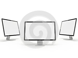 Three computer monitors isolated on white background