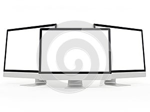 Three computer monitors isolated on white background