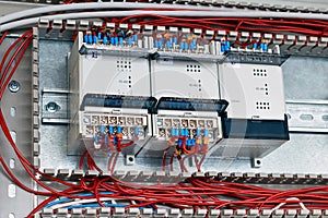 Three controllers or devices are fixed in the electrical Cabinet