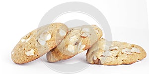 Three Cookie Biscuits With White Chocolate And Nut photo