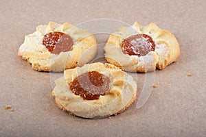 Three cookies on parchment