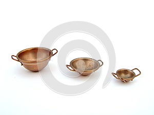 Three Copper Bowls