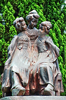 Three copper statue dancers (detail)