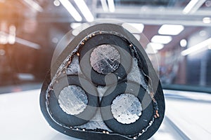 Three-core high-voltage cable with cutaway insulation