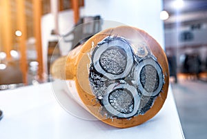 Three-core high-voltage cable with cutaway insulation
