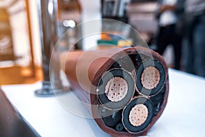 Three-core high-voltage cable with cutaway insulation