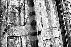 Three Cracked and Weathered Doors