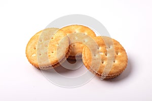 Three crackers on a white background