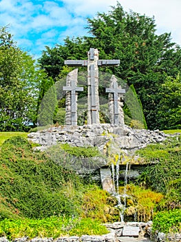 Three Crosses in landscaped gardens Balintubber Abbey