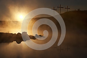 Three Crosses at Sunrise over a Foggy Lake Easter