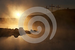 Three Crosses at Sunrise over a Foggy Lake Easter photo