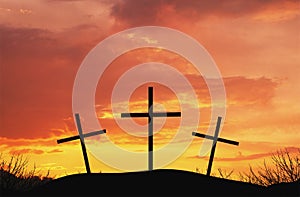 Three crosses on top af hill photo