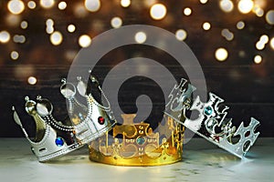 Three crowns of the three wise men with Christmas lights. Concept for Dia de Reyes Magos day. Three Wise Men photo